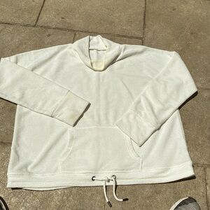 Pullover sweatshirt, has a small spot on the front